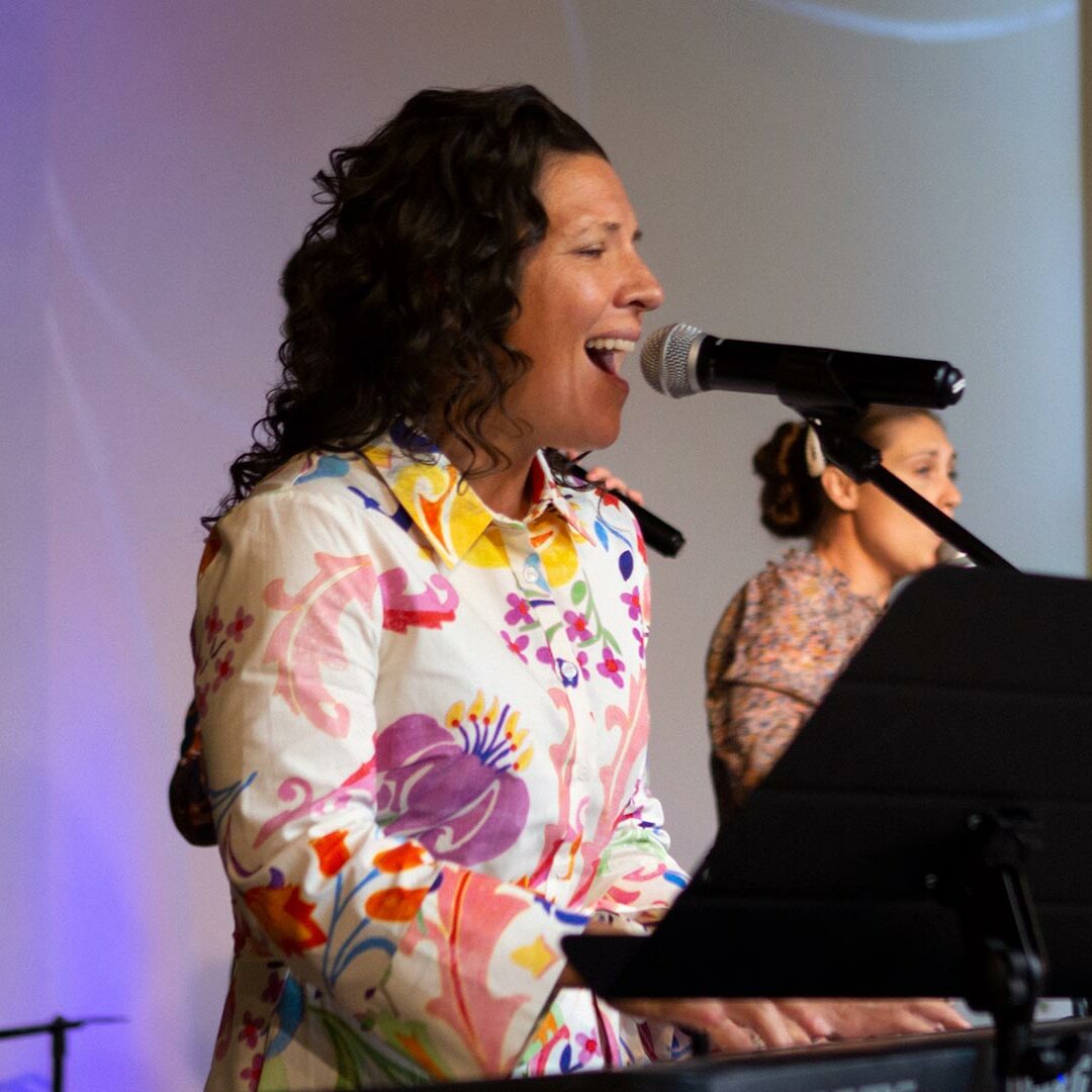 worshipper playing piano